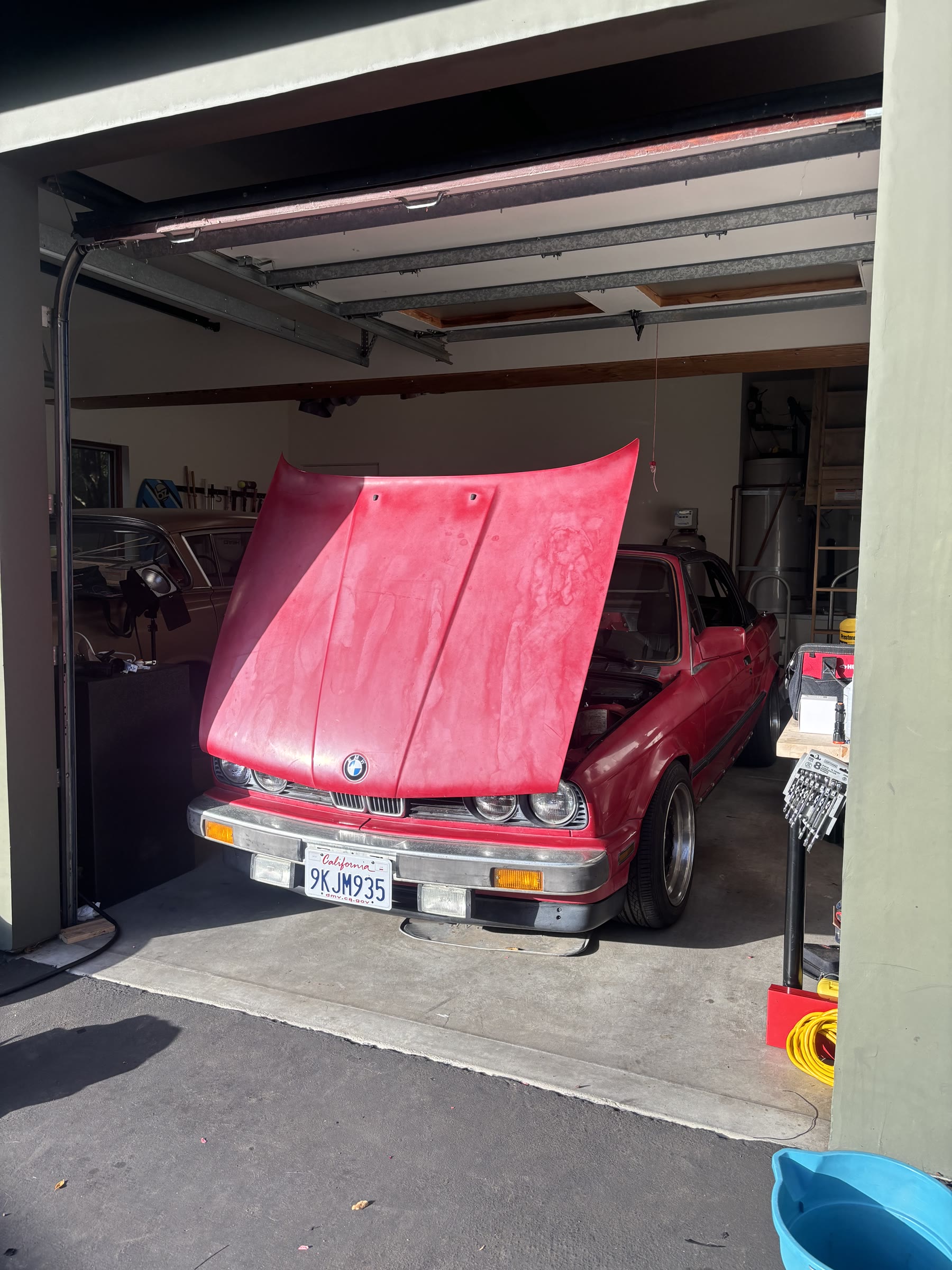 The completed Electric E30 with its hood open